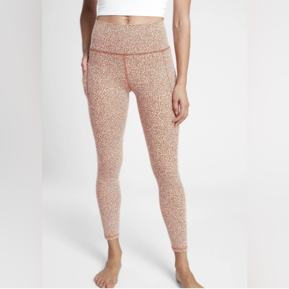 ATHLETA salutation stash pocket textured tights size XS